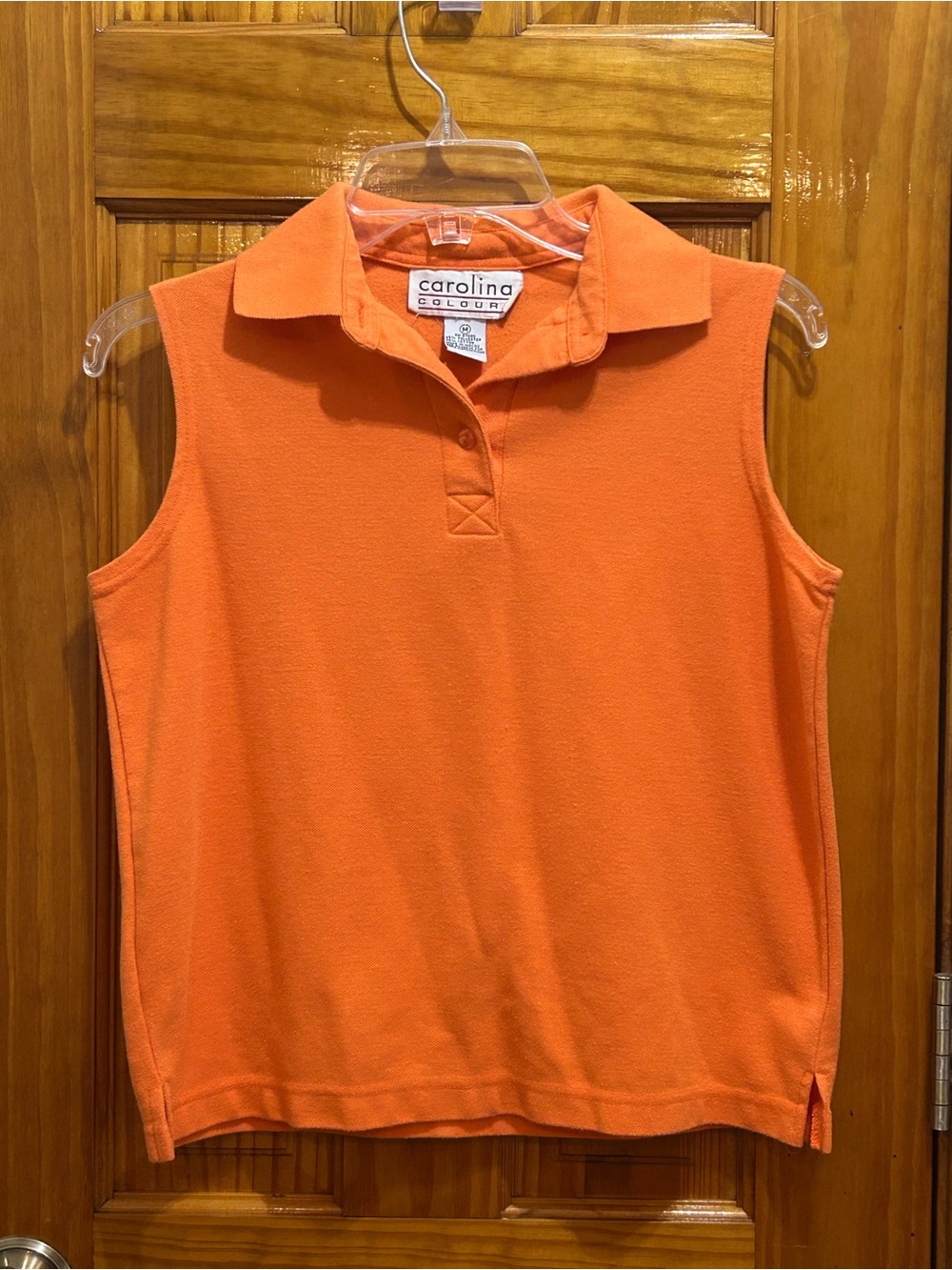 Cato Carolina Colours Sleeveless Orange Polo Blouse w/ 3 Buttons 
Ladies Medium